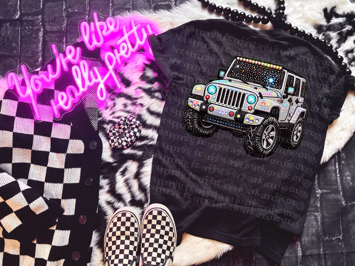 Sparkly white J (GWD) DTF transfer