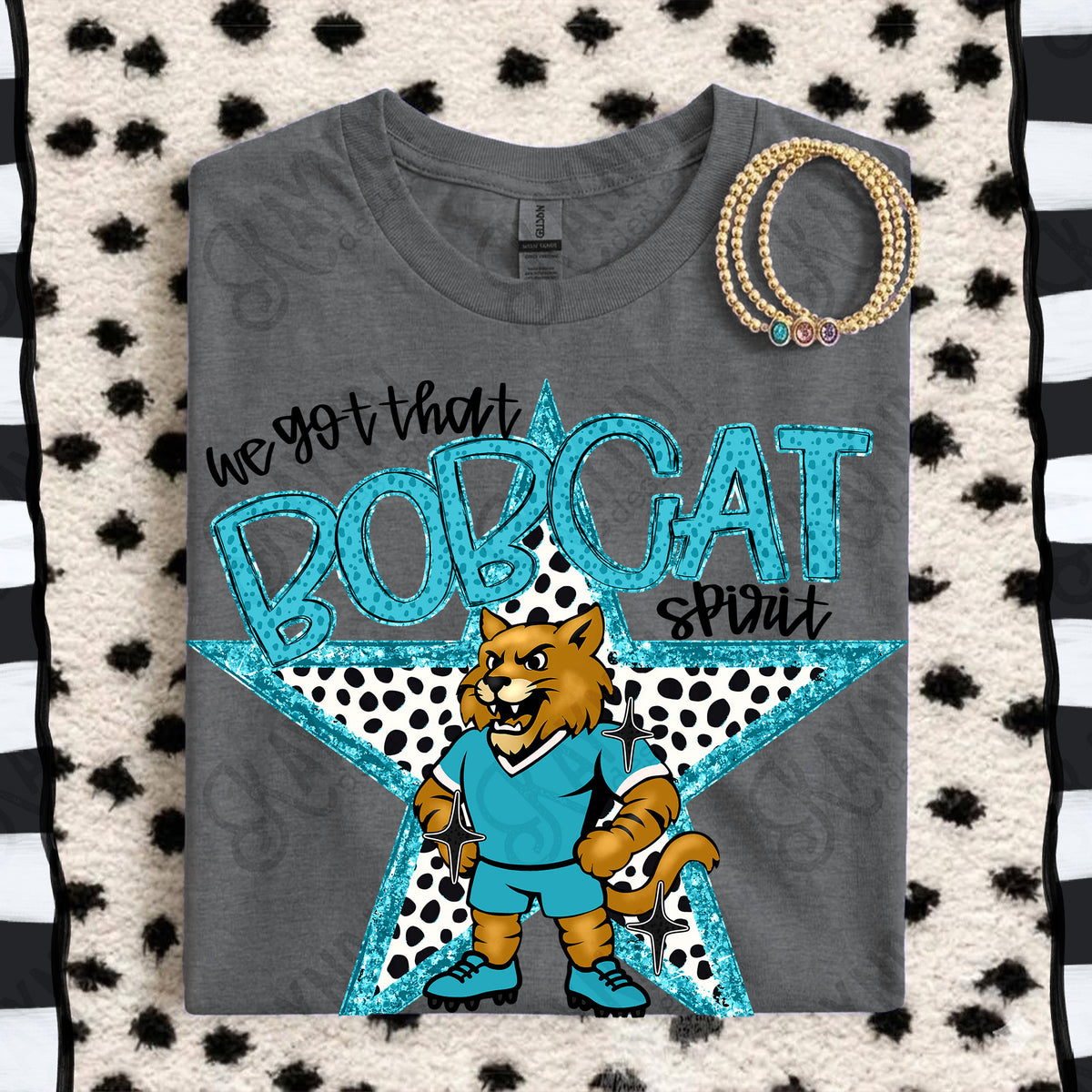 We got that Bobcat spirit star TEAL (Kayndi) DTF Transfer