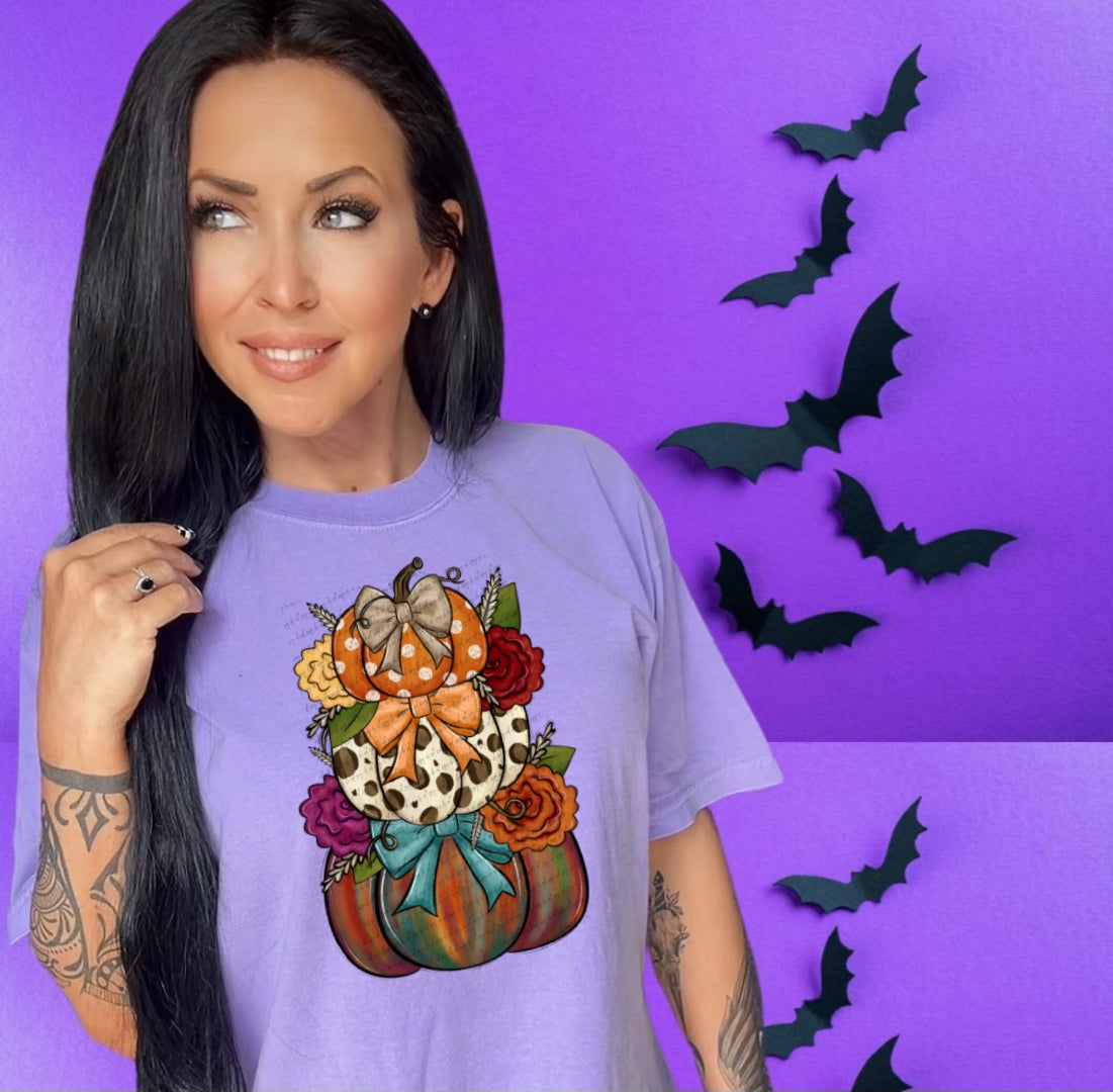Stacked pumpkins with florals tie dye leopard orange white dots DTF transfer