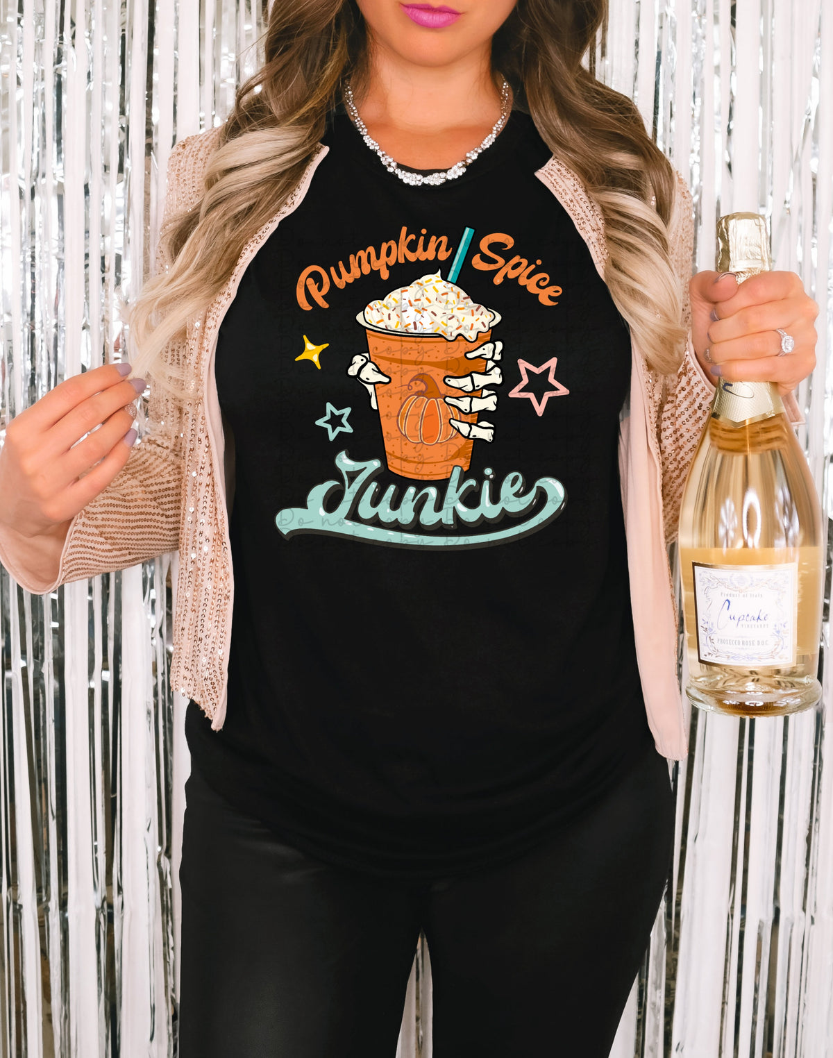 Pumpkin spice junkie (skellie hand with pumpkin on cup) 2557 DTF TRANSFER