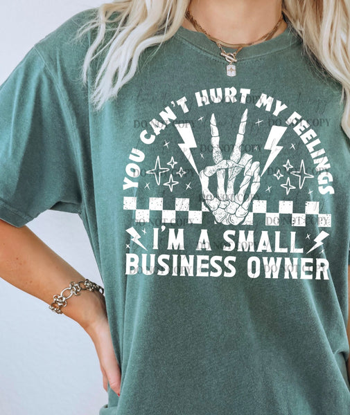 You can’t hurt my feelings I’m a small business owner (white font with skellie peace and checkered print) 16209 DTF Transfer