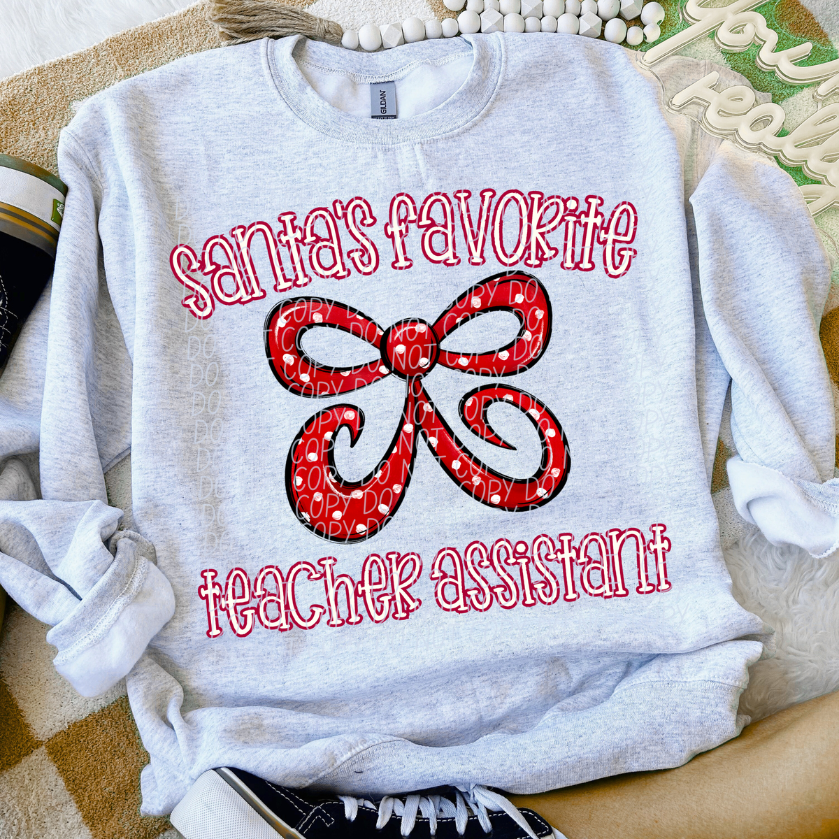 Santa's Favorite Teacher Assistant (City) DTF Transfer