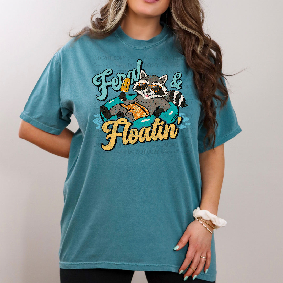 Feral & floatin raccoon (Scarlow) DTF Transfer