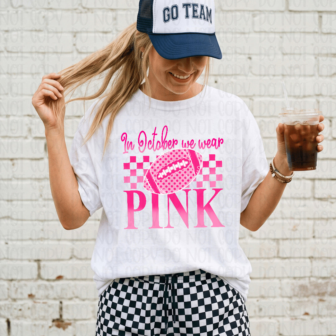 In October we wear pink polkadot football checkers background (Crafti) DTF Transfer