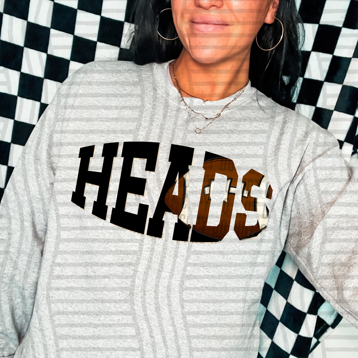 Heads varsity clipped football (Caplinger) DTF transfer