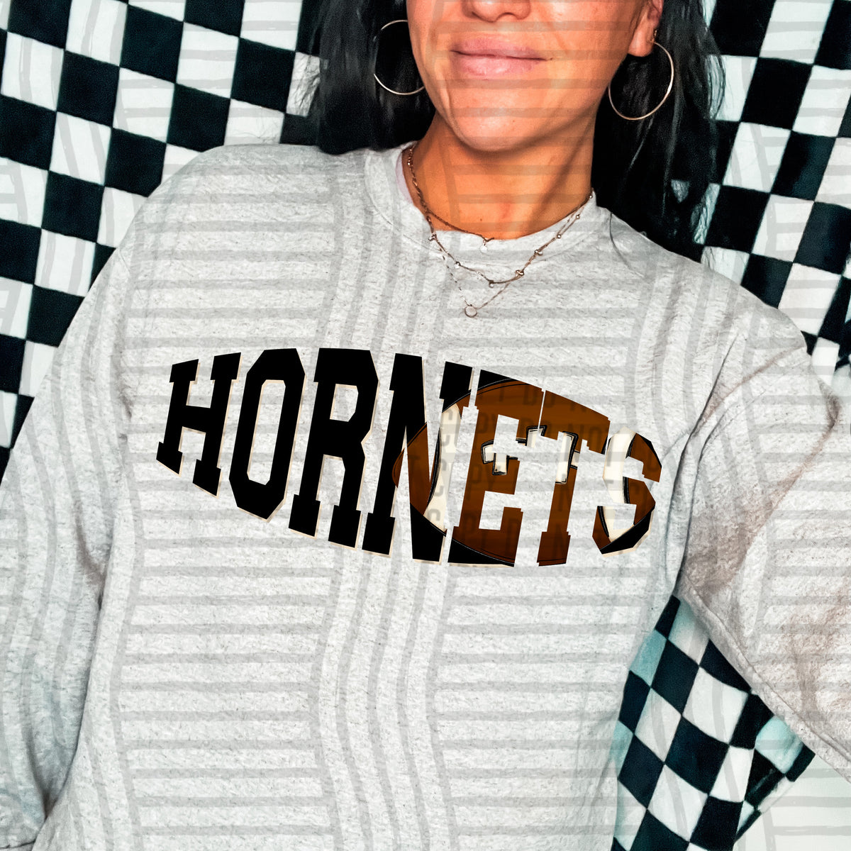 Hornets varsity clipped football (Caplinger) DTF transfer