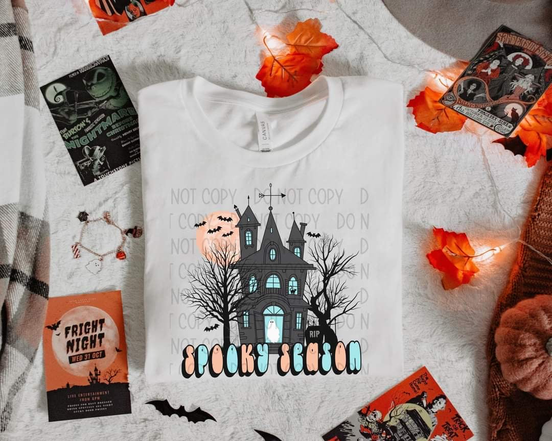 Spooky season haunted house blue and orange words DTF TRANSFER