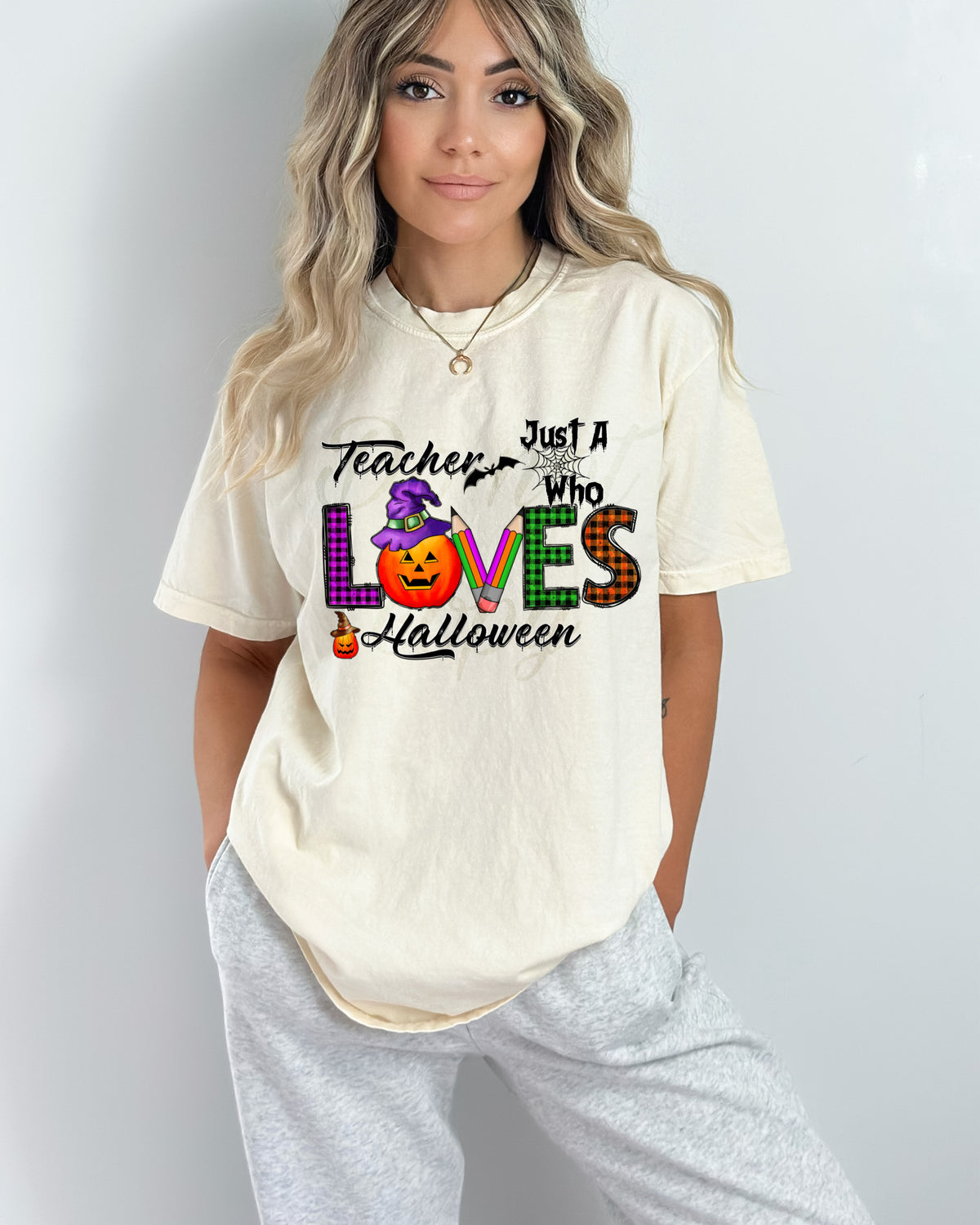 Just a teacher who loves Halloween DTF TRANSFER