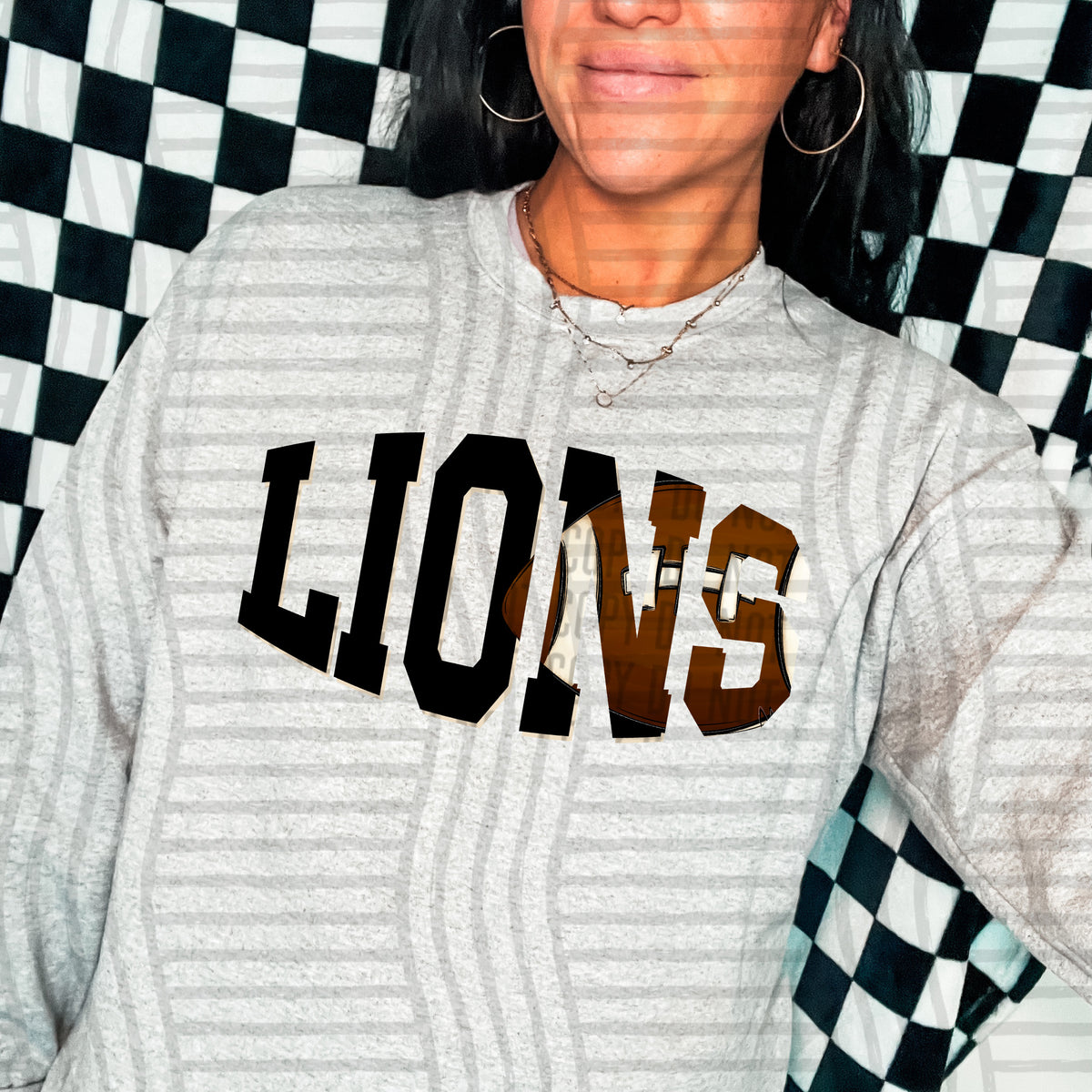 Lions varsity clipped football (Caplinger) DTF transfer