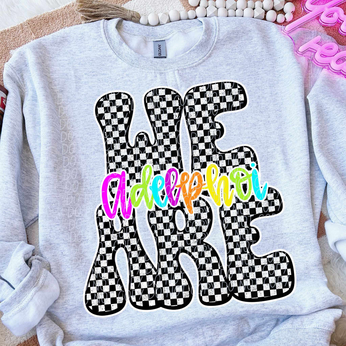 We are Adelphoi rainbow checkered (City) DTF transfer