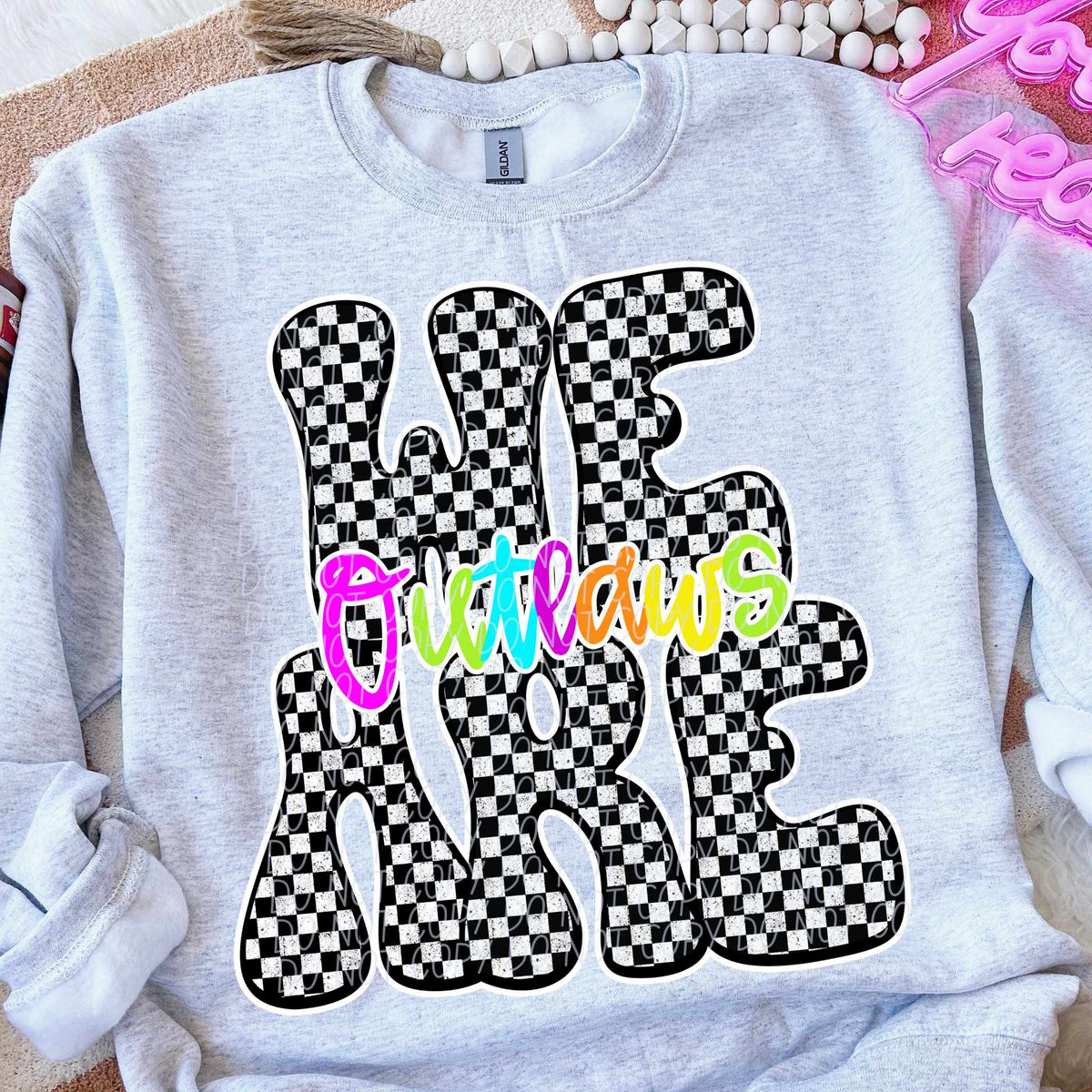 We are Outlaws rainbow checkered (City) DTF transfer