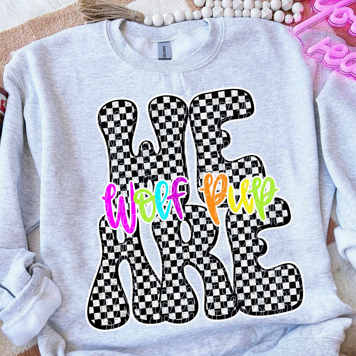 We are Wolf Pup rainbow checkered (City) DTF transfer