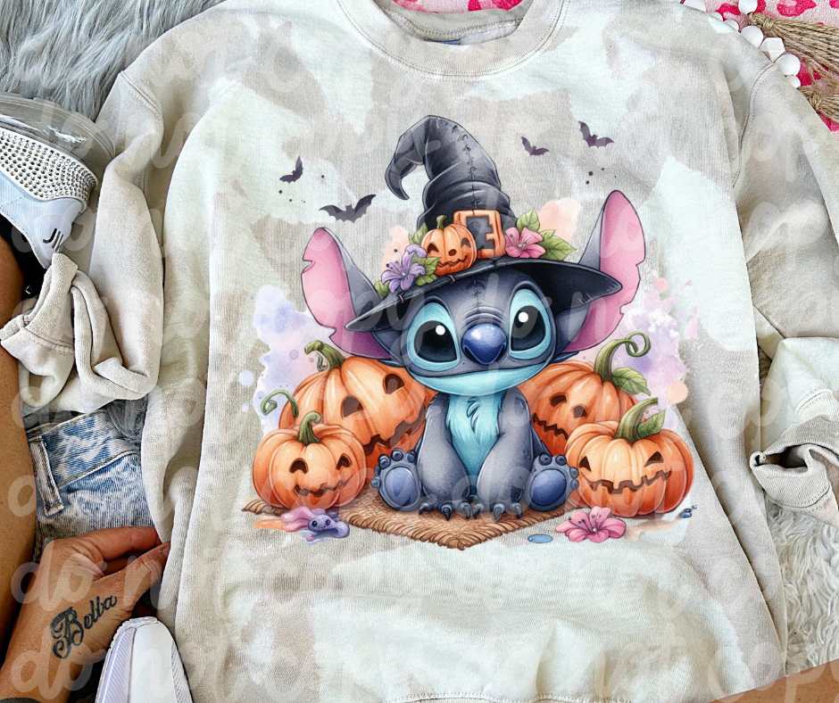 Blue creature with pumpkin DTF transfer