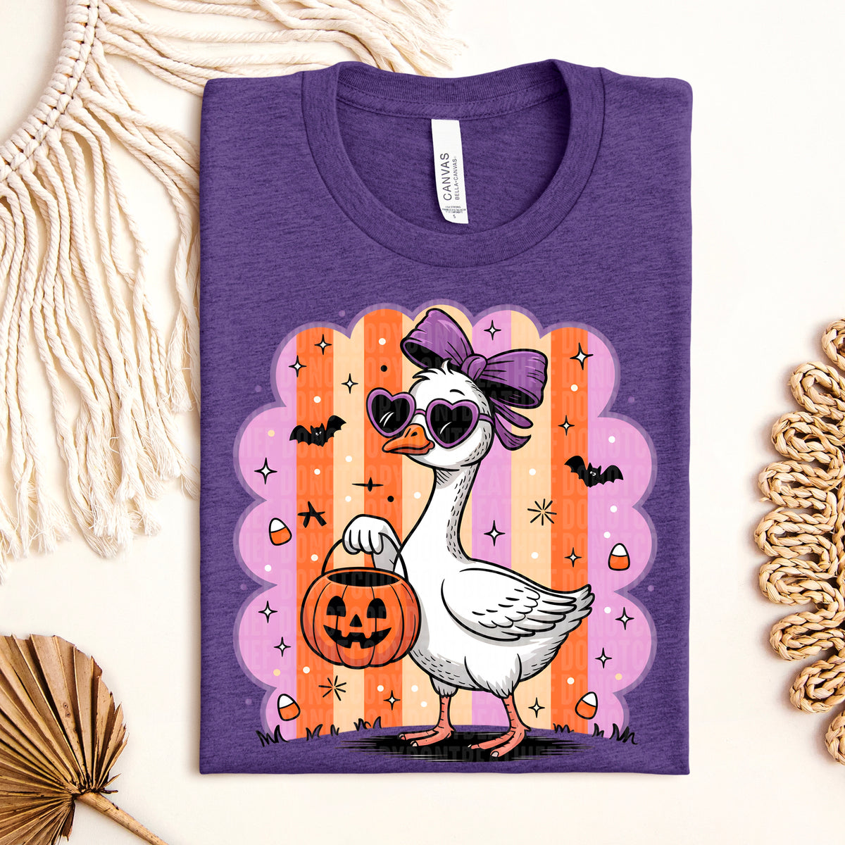 Goose purple bow halloween bucket striped background 111167 DTF transfer