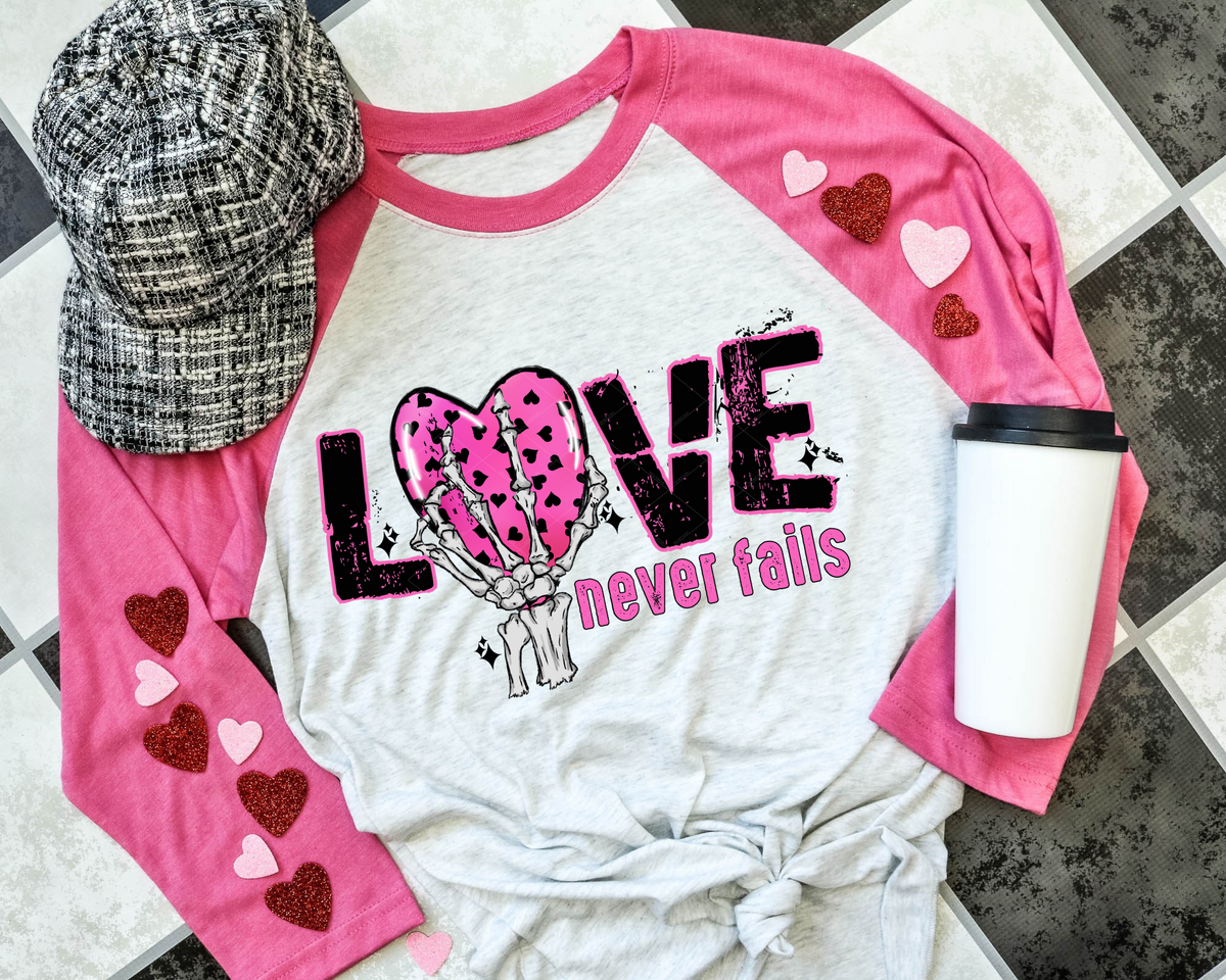Love Never Fails Skeleton Hand Pink Heart 1735 DTF TRANSFER