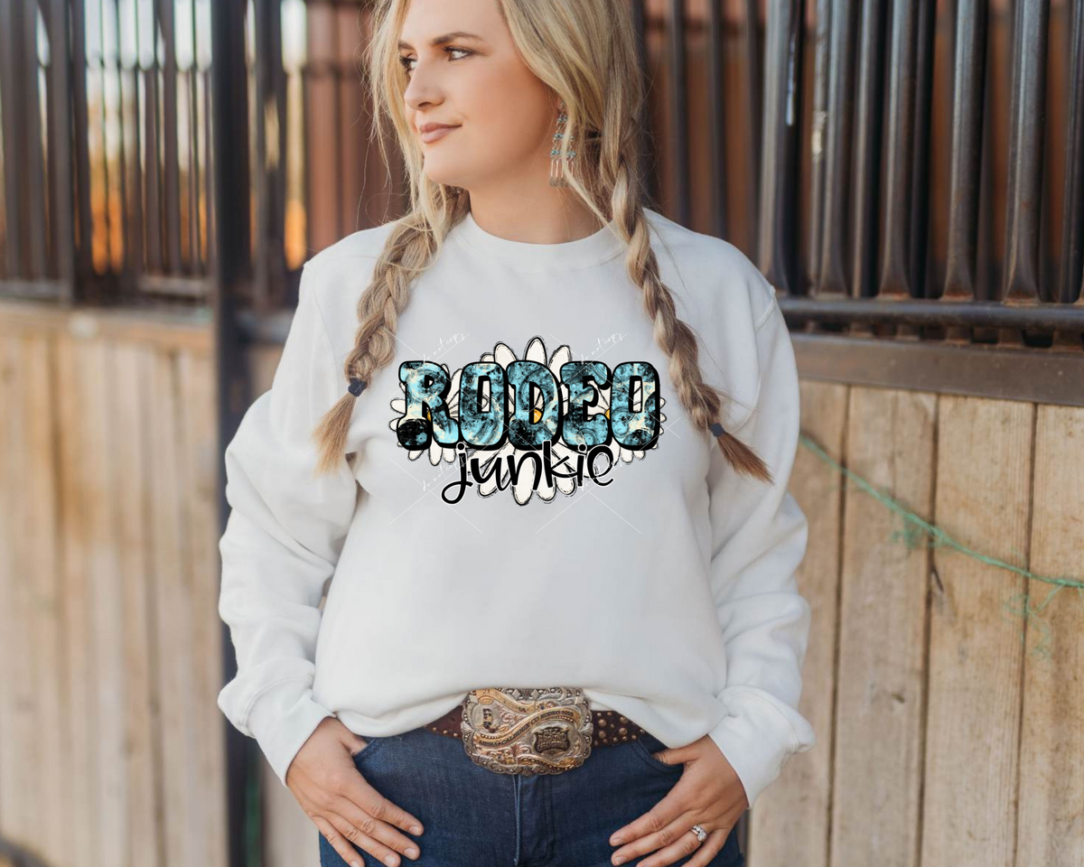 Rodeo Junkie (turquoise & black design filled lettering, daisy background) 8983 DTF Transfer