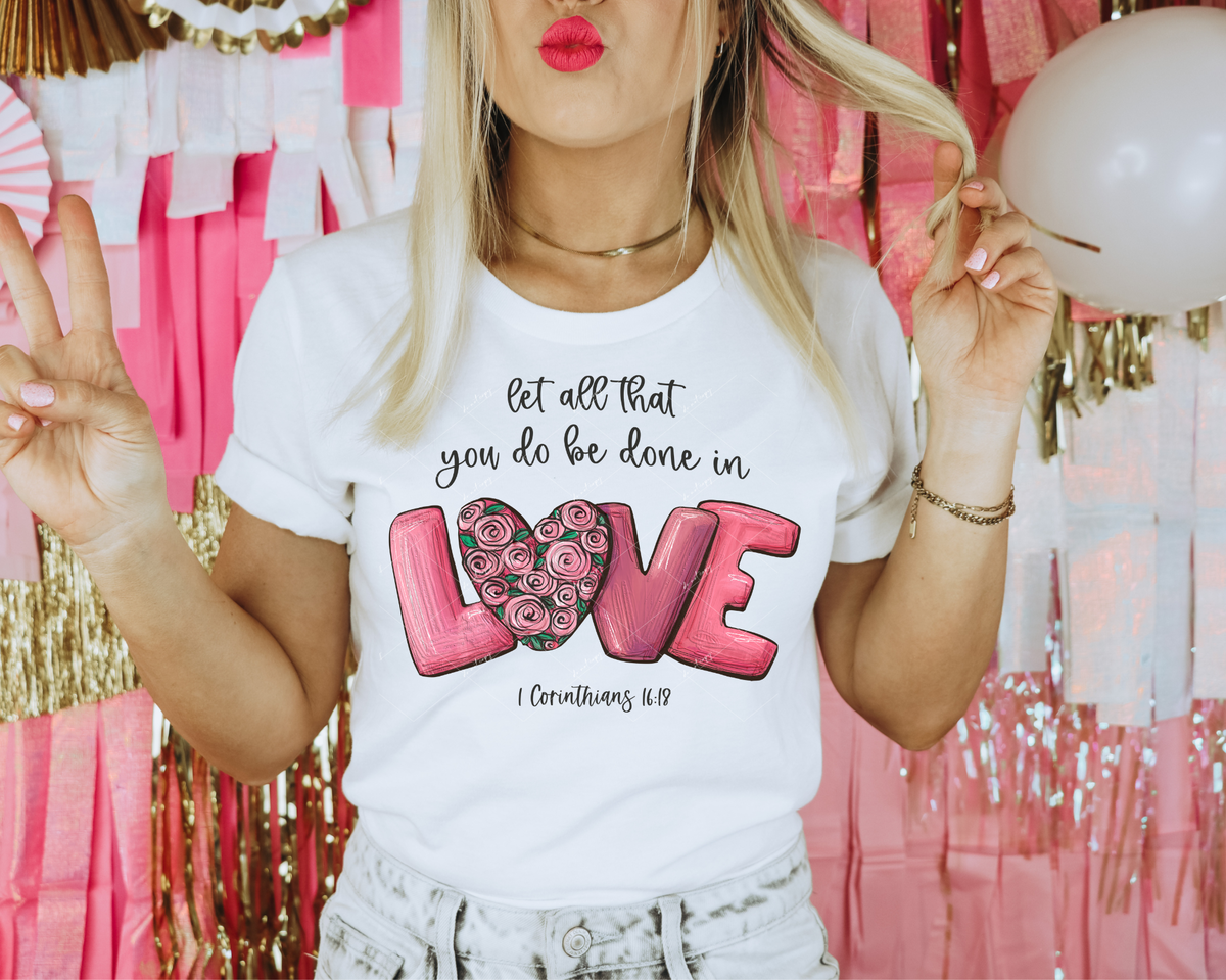 Let all that you do be done in love 1 Corinthians 16:18 (black lettering, love in pink paint strokes with pink heart of roses) 1676 DTF TRANSFER