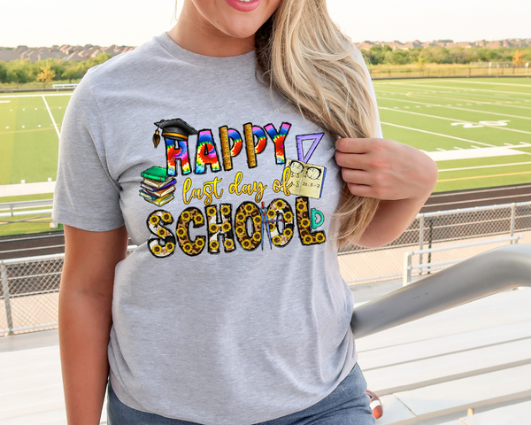 Happy Last Day Of School (block lettering sunflower & tie dye print filled, rulers, books, graduation cap) 1482 DTF TRANSFER