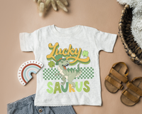 Lucky Saurus (dinosaur, green checker, St. Patrick green colors, clover, distressed lettering) DTF TRANSFER