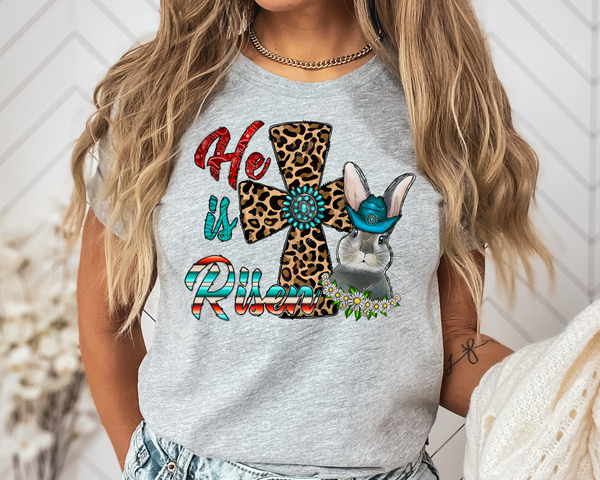 He Is Risen (bunny with cowboy hat, cross with leopard print and turquoise pendant, western, turquoise, red bandana print letter fill) DTF TRANSFER