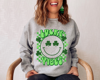 Lucky Vibes (smiley face, green checkers, clovers, variety of greens, 70's vibe lettering) DTF TRANSFER