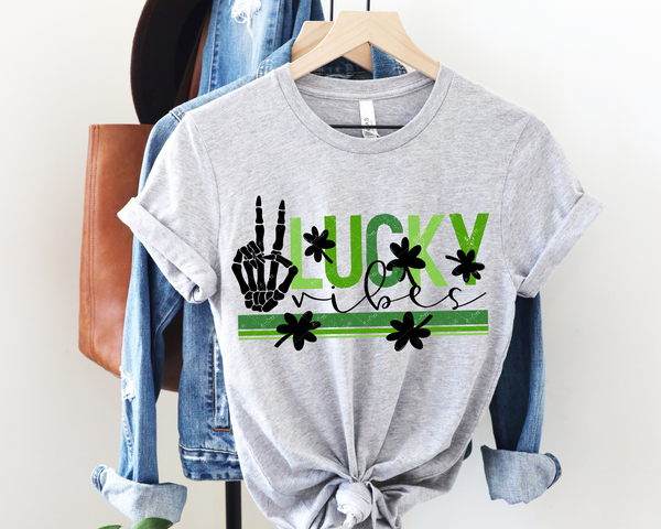 Lucky Vibes (skeleton hand peace sign, green stripes, black clovers, variety of greens, block distressed lettering) DTF TRANSFER