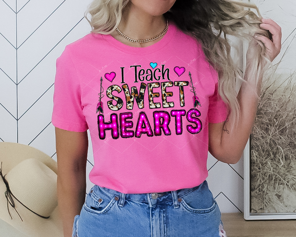 I Teach Sweet Hearts (arrows, pink hearts, letters filled with cow print, pink florescent with lights, black lettering outlined in white) 1578 DTF TRANSFER