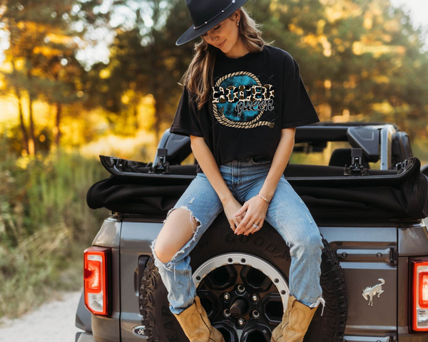 Rodeo Queen (rope frame, blue background, block letters with cowhide fill, black handwriting distressed lettering) DTF TRANSFER