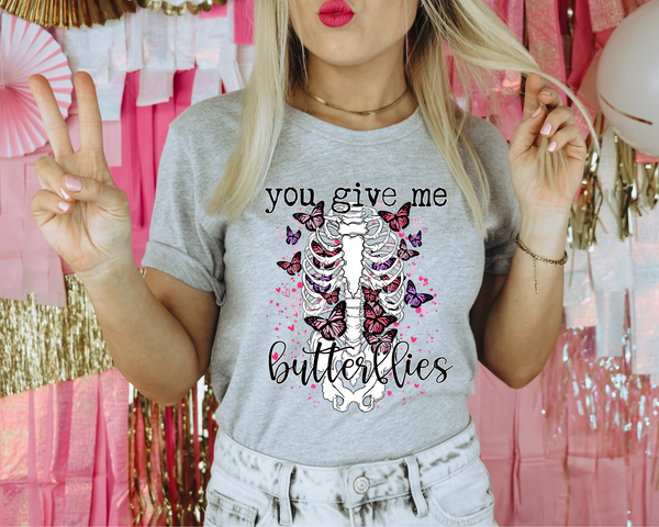 You Give Me Butterflies (skeleton rib cage, butterflies pink & purple, little pink hearts scattered) 1617 DTF TRANSFER