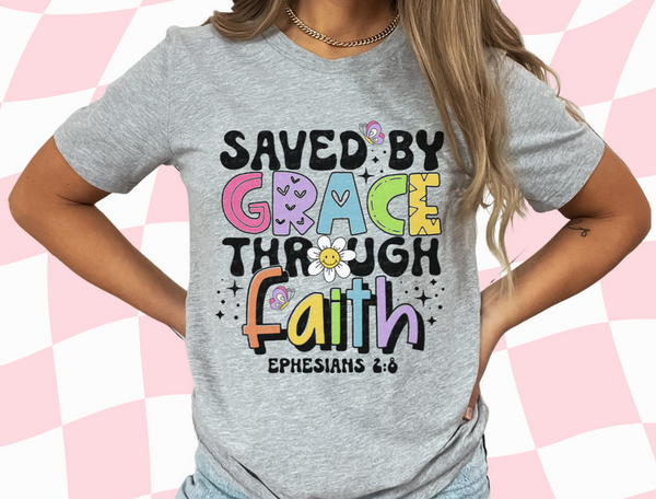 Saved by Grace through faith ephesians 2:8 colorful and black font with daisy DTF TRANSFER