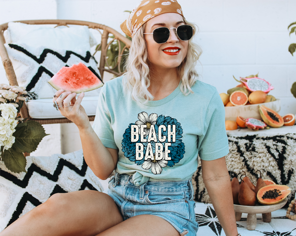 Beach Babe (blue floral background, white block distressed lettering) 8828 DTF Transfer