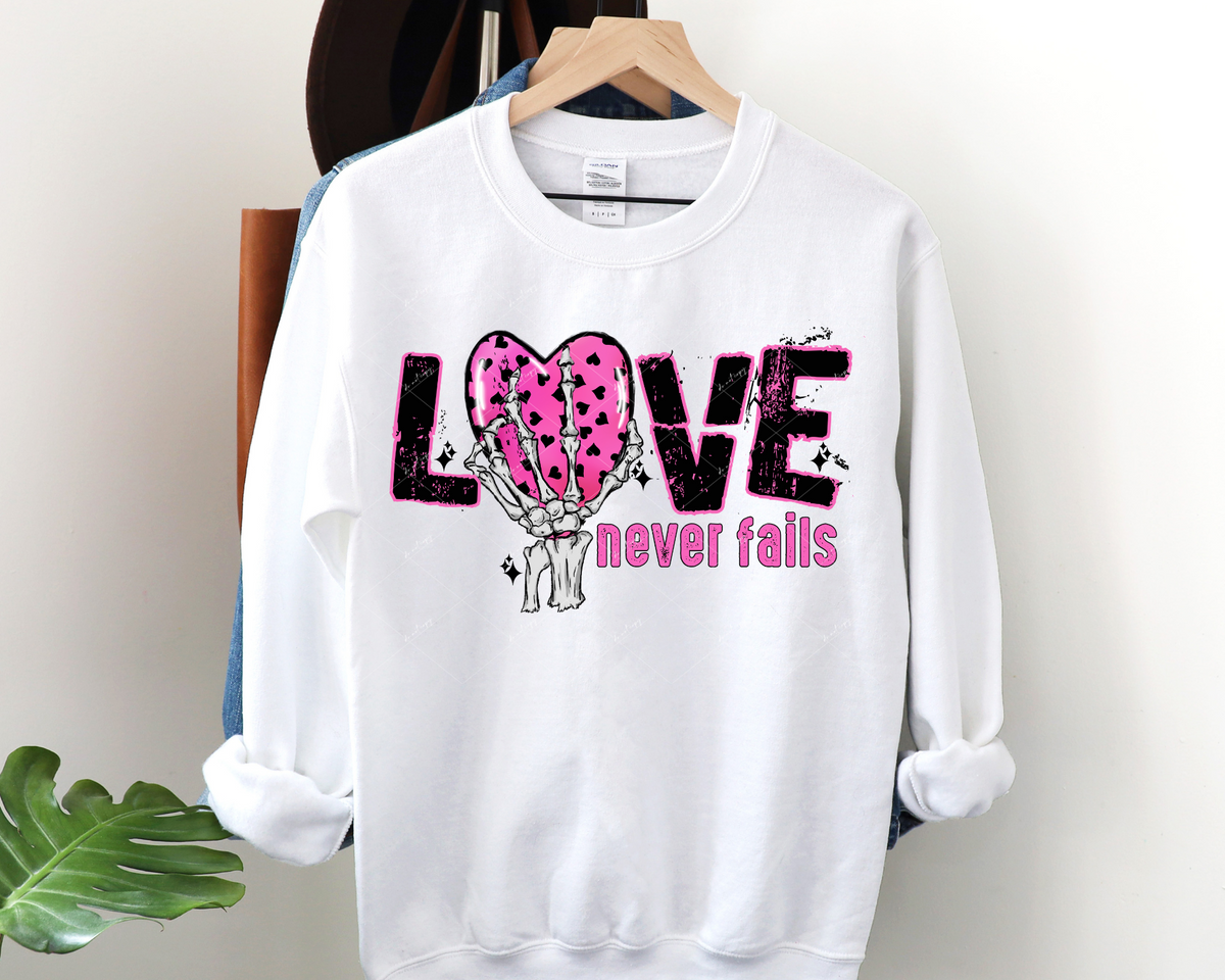 Love never fails (bright pink, heart, skeleton hand) DTF TRANSFER