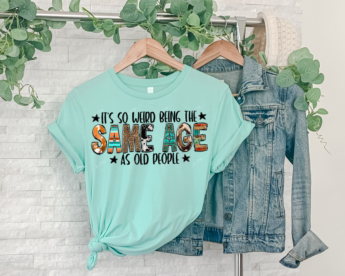 It's So Weird Being The Same Age As Old People (solid black letters, block letters filled with western patterns) 1626 DTF TRANSFER