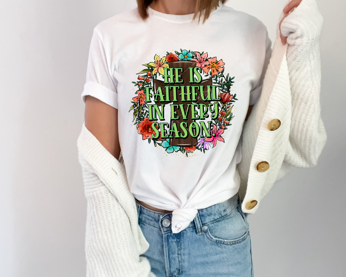 He Is Faithful In Every Season (brown wooden cross, lily wreath frame, green lettering) 8949 DTF Transfer