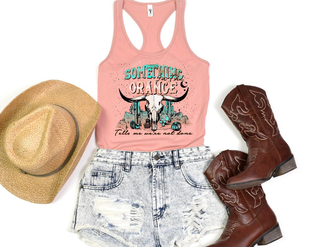 Something In The Orange Tells Me We're Not Done (cow skull, desert landscape background, teal & coral colors) 8880 DTF Transfer