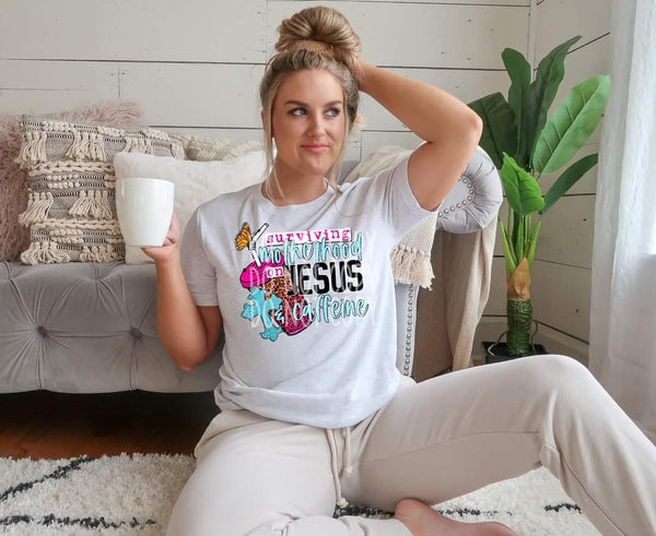 Surviving motherhood on Jesus and caffeine (cup, cross, butterflies) DTF TRANSFER